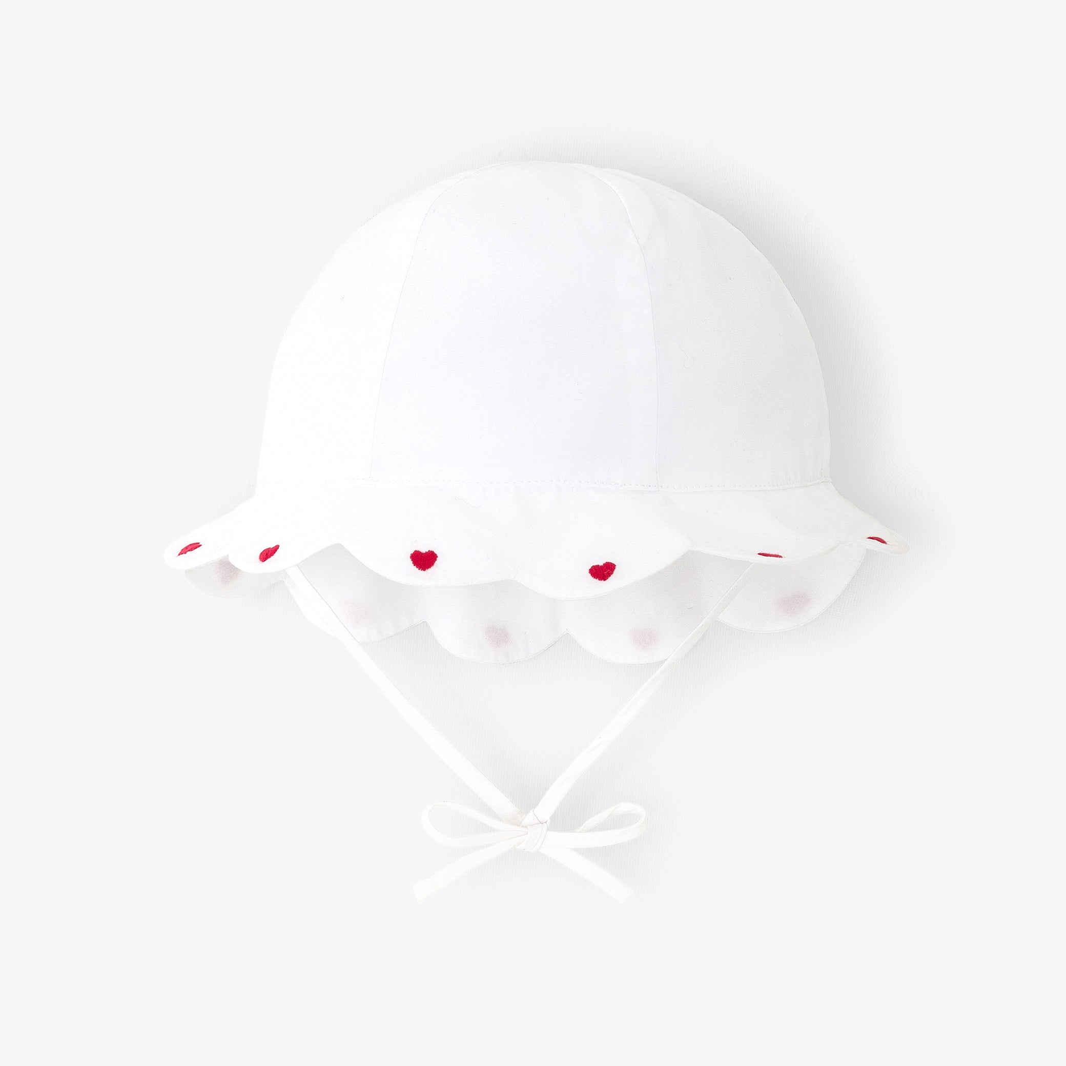 Baby girl hat in cotton with scalloped edge