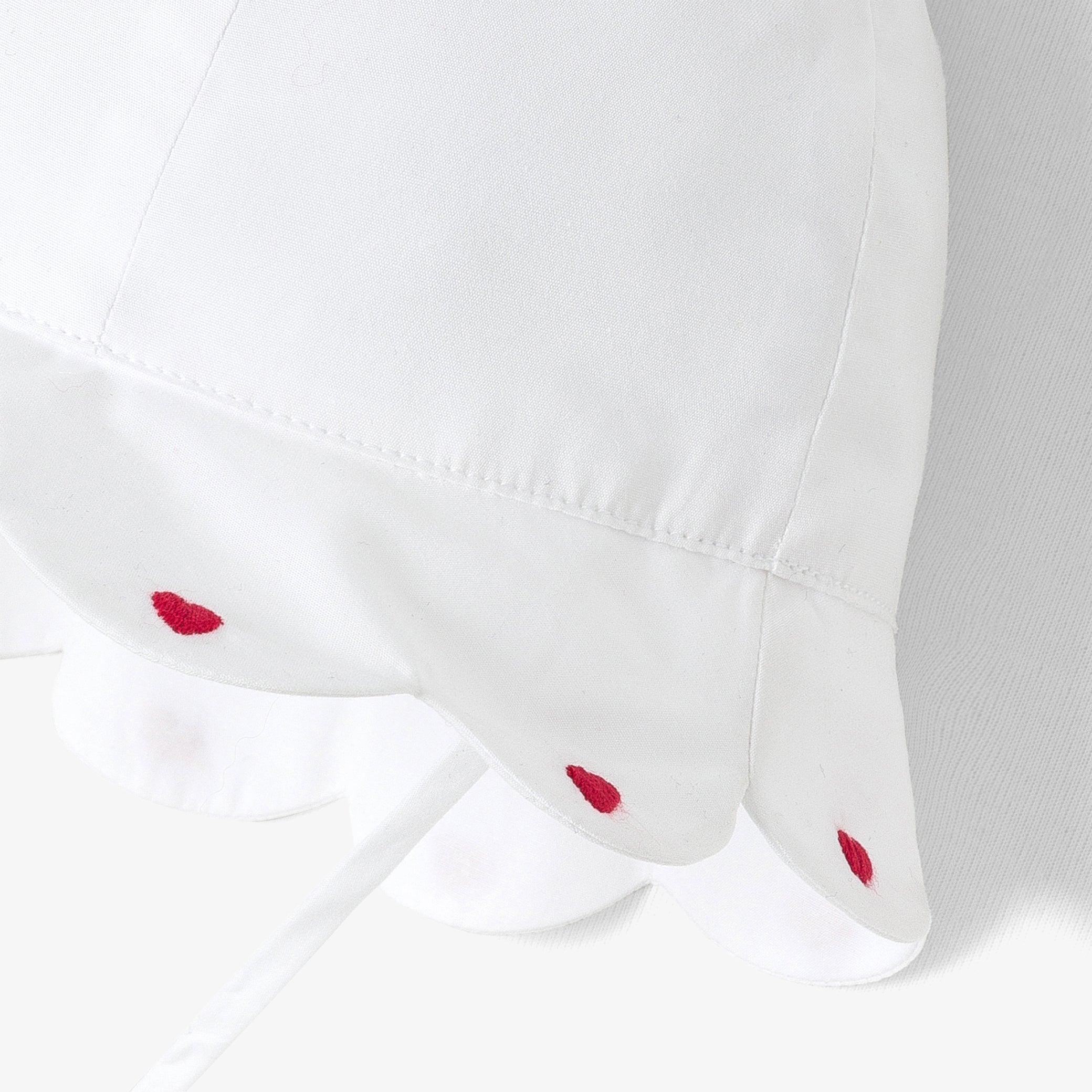 Baby girl hat in cotton with scalloped edge