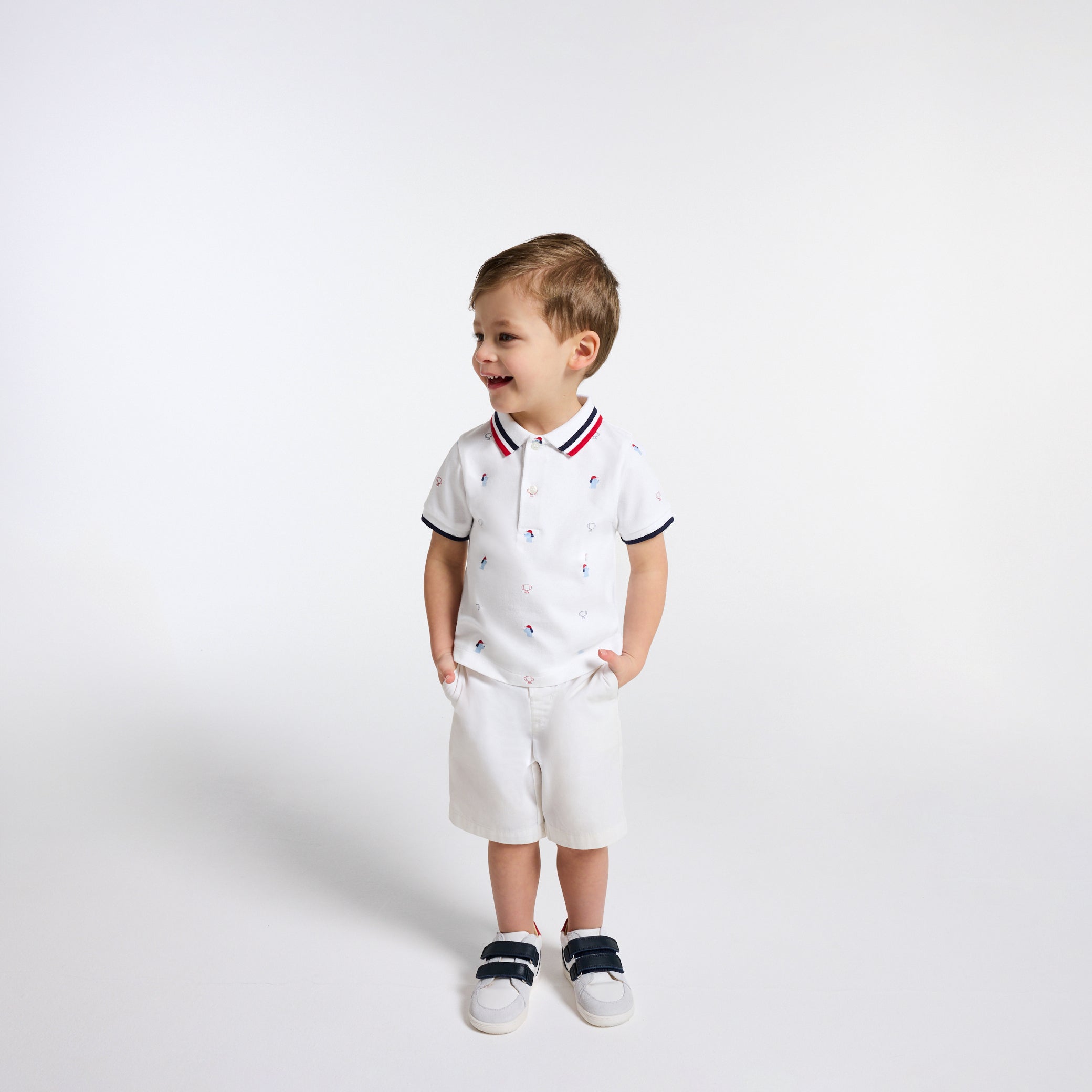 Baby boy polo shirt in printed cotton piqué