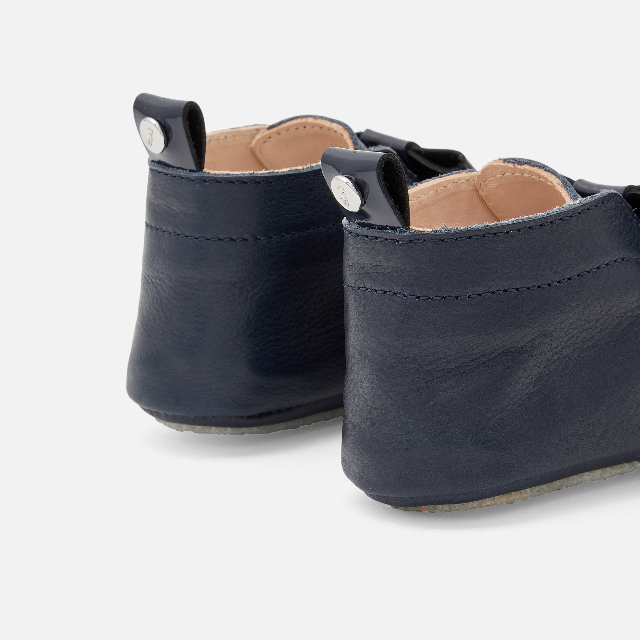 Baby girl leather sleepers